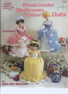 two crochet dolls are shown in front of flowers and vases with the words threadd crochet bathroom tissue dolls