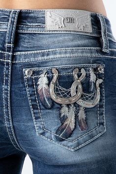 Mid-rise dark wash boot cut denim with horseshoe and feather designs. 91% Cotton, 6% Polyester, 3% Elastane Machine wash inside out in cold water with like colors. Dry flat. Front Rise: 9"; Back Rise: 14" Inseam: 34" Style No. M3996B-K1319 Denim Repurpose, Cute Country Outfits, Bootcut Jean, Blue Tone, Leather Label, Feather Design, Body Dress, Boot Cut Denim, Comfy Fashion