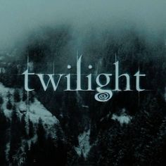 the title for twilight is shown on a black and white photo with trees in the background