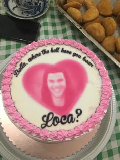 there is a cake that has been decorated with an image of a person on it