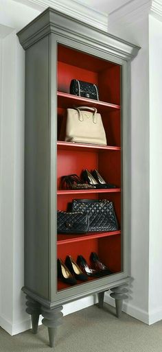 an armoire with several pairs of shoes and purses