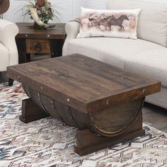 Exclusive Item - The perfect centerpiece for your ranch living room, this beautiful and rugged wood table with metal rivets and nailhead accents is crafted from an old tequila barrel. 47 1/4"W x 35 1/2"D x 17 3/4"H. Western Coffee Table, Tequila Barrel, Ranch Living Room, Barrel Coffee Table, Rustic Wooden Coffee Table, Ranch Living, Farmhouse Coffee Table, Coffee Center, Custom Coffee Table