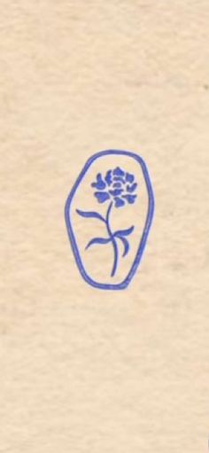 a blue and white drawing of a flower in a vase on a piece of paper