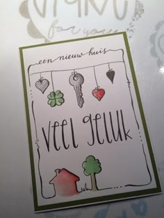 a card with the words veel seuk written on it and pictures of houses