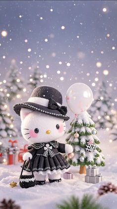 a hello kitty doll standing next to a christmas tree in the snow with a balloon