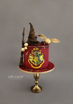 a harry potter hat on top of a cake