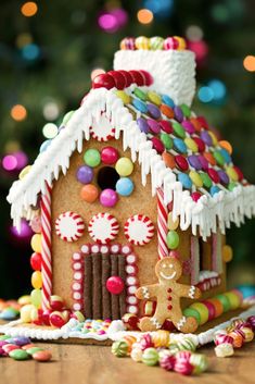 a gingerbread house decorated with candy and candies