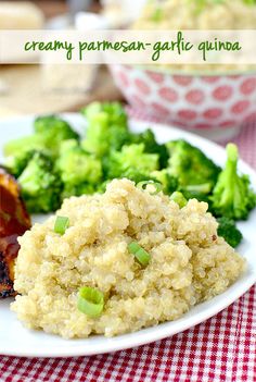 a white plate topped with meat covered in gravy next to broccoli