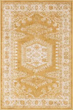 a yellow and white rug with an intricate design