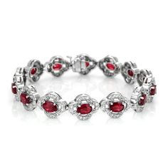 Oval shaped intense color intensity eye clean 14 rubies in 14K white gold bracelet. #lovenecklaceforher #fallbracelets #coolbraceletsdiy #jewelrynecklaces #braceletsidea Red Diamond Oval Bracelet, Red Oval Diamond Bracelet, Red Diamond Oval Tennis Bracelet, Red Oval Diamond Gemstone Bracelet, Luxury Red Oval Bracelet, Red Oval Diamond Classic Bracelet, Red Oval Tennis Bracelet Fine Jewelry, Red Oval Tennis Bracelet For Anniversary, Red Oval Classic Diamond Bracelet