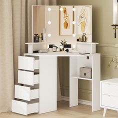 a white dressing table with drawers and lights