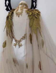 Hummingbird Inspired Fashion, Angel Clothing Reference, Small Angel Wings Costume, Angel Goddess Costume, Angel Inspired Dress, Clothes With Feathers, District 2 Outfits, High Priestess Outfit, Artemis Outfit Aesthetic