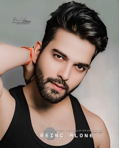 a man with a beard wearing an orange band around his neck and black tank top