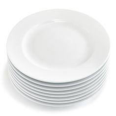 a stack of white plates stacked on top of each other in front of a white background