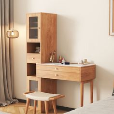 a wooden desk and chair in a room