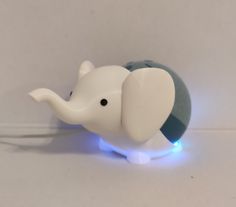 an elephant light up toy with blue lights