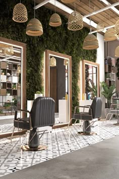 the interior of a hair salon with chairs and mirrors hanging from the ceiling, surrounded by greenery