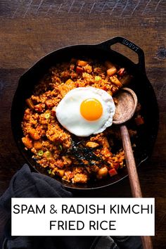 spam and radish kimchi fried rice in a skillet with a wooden spoon