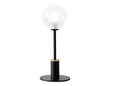 a black table lamp with a white glass ball on it's base and a metal stand