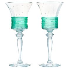 two clear glass goblets with green rims