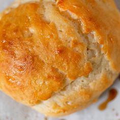 a close up of some bread on a piece of paper