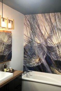 Blue floral wallpaper in a dandelion bathroom behind a bathtub and vanity Dandelion Mural, Dandelion Wallpaper, Blue Floral Wallpaper, Dandelion Seeds, The Dandelion, A Dandelion, Photo Mural, Dandelion Seed