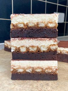 four pieces of cake stacked on top of each other