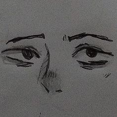 a black and white drawing of a woman's face with her eyes wide open