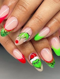 23 Mischievous Grinch Nails That’ll Totally Slay Your Holiday Look! | Everygirl Edit Christmas Nails Grinch Easy, Grinch Stilleto Nails, Grinch Gel Nail Designs, Grinch Nails Designs Short, Grinch Christmas Nails Easy, Christmas Nails Grinch Art Designs, Grinch Nails Step By Step, Unique Holiday Nails, Grinch Gel Nails