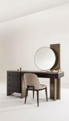 a desk with a mirror and chair in front of it on top of a white floor