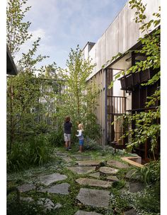 two children are playing in the garden