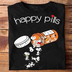 Snoopy happy pills for fan Tshirt Hoodie SweaterSnoopy happy pills for fan Tshirt Hoodie Sweater   This model reduces inventory waste and allows customers to create personalized designs. These t-shirts are made from high-quality materials and come in a range of sizes and colors, making them versatile for any occasion. Snoopy Tshirt, Sopwith Camel, Sweater Design, Black And Navy, Sweater Hoodie, Heavy Cotton