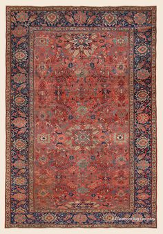 an antique persian rug with red and blue colors