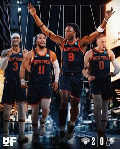 the new york basketball team is walking down the street in front of an audience with their hands up