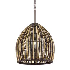 a light hanging from a ceiling fixture made out of wood and rattan with an iron chain