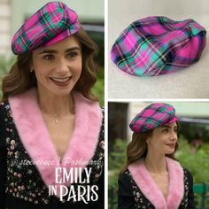 a woman wearing a pink and green plaid hat with faux fur trims on it