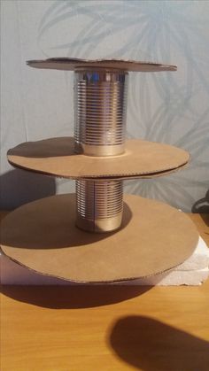 three tiered cake stand made out of cardboard