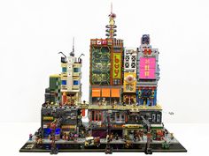 a lego model of a city with lots of buildings