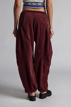 Updated BDG cargo pant in a wide, barrel leg silhouette. Designed in a soft corduroy fabric featuring a mid-rise elasticized waist, oversized side pockets and cinched hems. Only at Urban Outfitters. Features BDG Em corduroy pocket pant Barrel leg pant Soft and lightweight corduroy Midrise elastic waist Oversized side pockets with draped detailing Cinched hems Wide leg fit Full length Easy pull-on style UO exclusive Content + Care 90% Polyester, 8% nylon, 2% spandex Machine wash Imported Size + F Non-stretch Trendy Corduroy Bottoms, Casual Non-stretch Corduroy Bottoms, Bdg Corduroy Pants, Straight-leg Corduroy Pants With Hip Pockets, Stretch Full-length Corduroy Pants, Velour Pants, Elevated Basics, Cargo Pant, Leg Pants