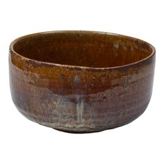 an old brown bowl is shown on a white background