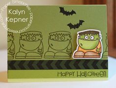 a green halloween card with a cartoon character