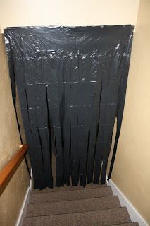 the stairs are covered with black tarp