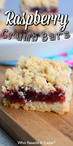 raspberry crumb bars on a cutting board with the words, who needs a cape?