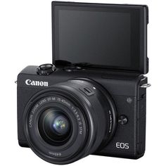 the canon eos camera is shown with its flash card attached to it's back