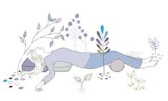 a woman is laying on her stomach in the middle of flowers and plants, with one leg up