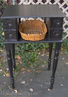 a black table with a basket on top