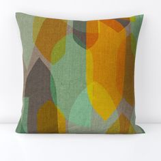 a pillow with an abstract design on it