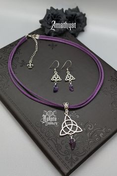 Matching necklace and earrings set. Triquetra charms with natural amethyst stone dangles. Beautiful! 💜 . . . . . #hekatejewelry #hekate #celticgoddess #triquetra #necklaces #earrings #silverjewelry #amethystjewelry #amethyst #naturalstones #witch #witchyjewelry #punkjewelry #gothjewelry #gothicjewelry #darkjewelry #metalgirl #gothicgirl #altgirl #gothgirl Triquetra Jewelry, Triquetra Necklace, Amethyst Stone Necklace, Stones Necklace, Amethyst Stones, Purple Jewelry