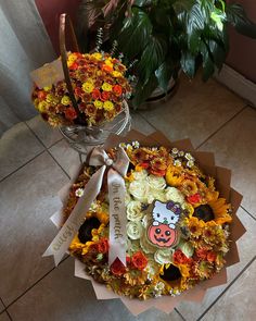 a bouquet of sunflowers and roses in a basket