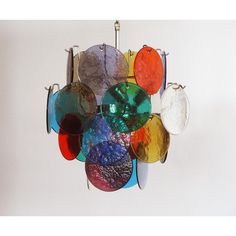 a multicolored chandelier hanging from the ceiling